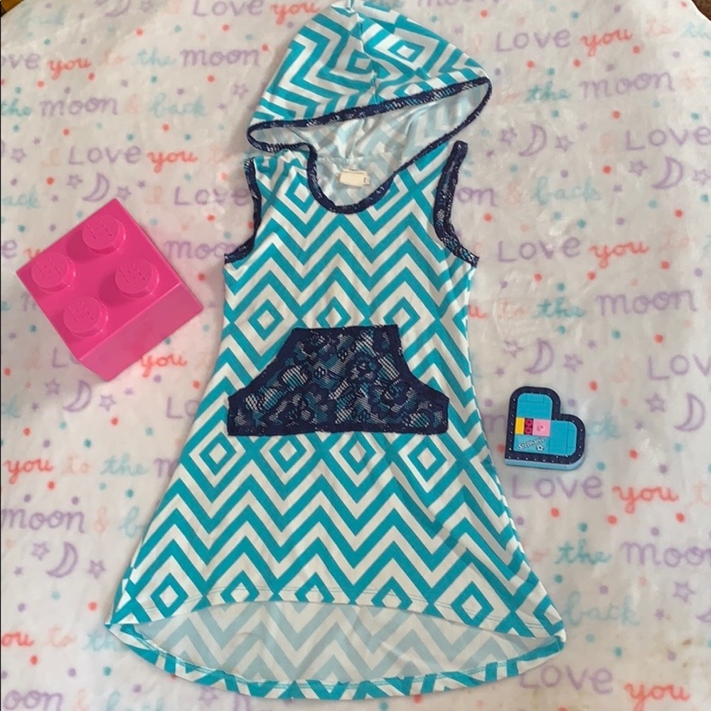 Chevron pattern teal and white tank dress.